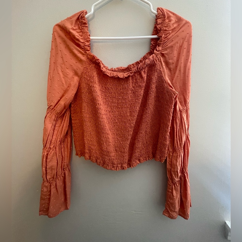 Cropped long sleeve blouse